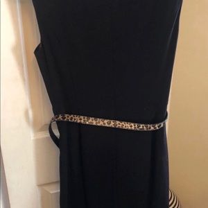 Women black dress. Leopard belt